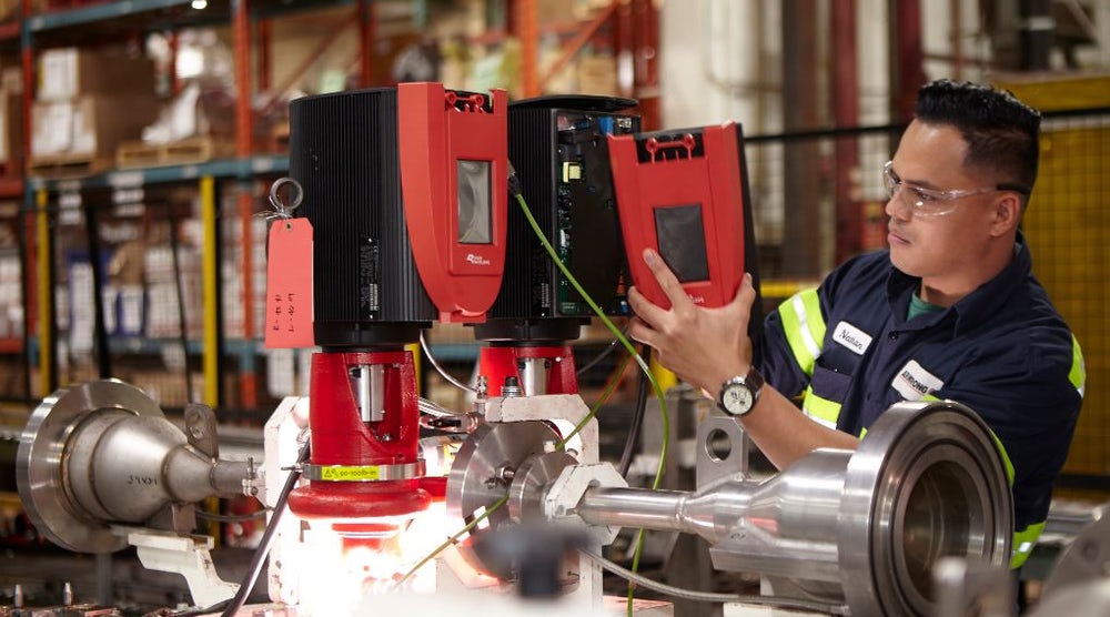 Technician working on Armstrong pumps