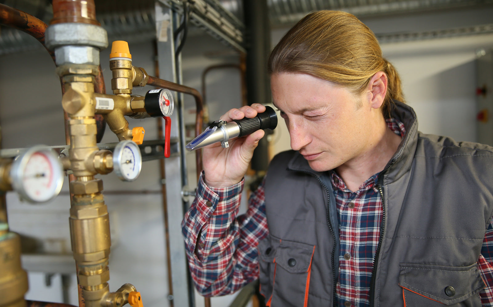 Technician Checking Water Quality in Hydronic System